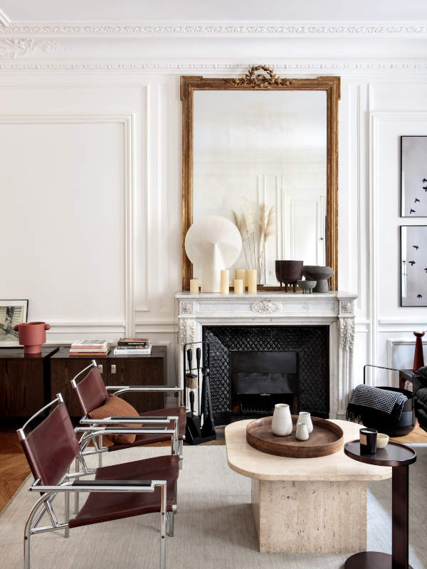 An elegant Haussmanian apartment with a neutral palette and a retro ...