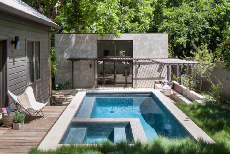 A modern pool and casita in an Austin backyard